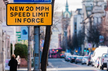 Road sign in a UK city centre warning motorists that a new 20 mile per hour speed limit is in place