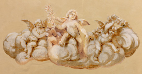 REGGIO EMILIA, ITALY - APRIL 12, 2018: The fresco of angels in church Chiesa di San Agostino from 17. cent.