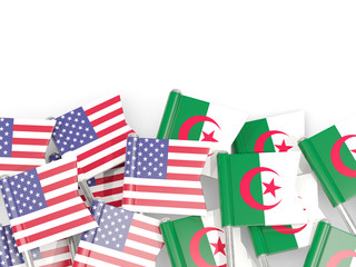 Pins with flags of United States and algeria isolated on white