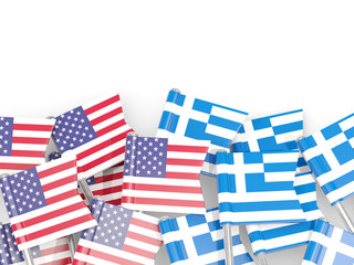 Pins with flags of United States and greece isolated on white