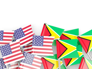Pins with flags of United States and guyana isolated on white