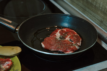 Making dinner in restaurant. Professional cooker