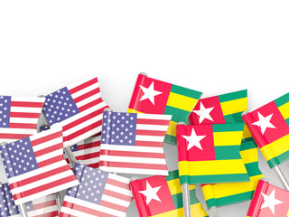 Pins with flags of United States and togo isolated on white