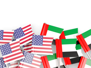 Fototapeta na wymiar Pins with flags of United States and united arab emirates isolated on white