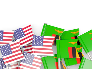 Pins with flags of United States and zambia isolated on white