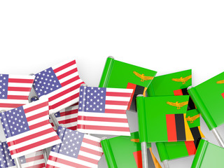 Fototapeta premium Pins with flags of United States and zambia isolated on white