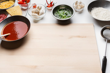 Ingredients For Cooking Pizza In Bowls On Table