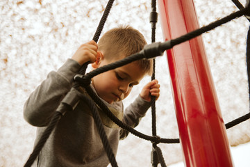 Obraz premium A little boy in the playroom