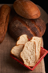 bread on sacking. Bread slices and crumbs viewed from above. Top view