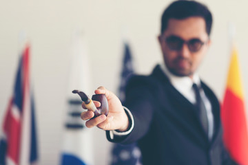 Businessmen look confident with the pipe.