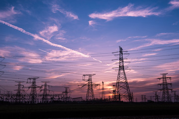 Silhouette of Power Supply Facilities at Sunset