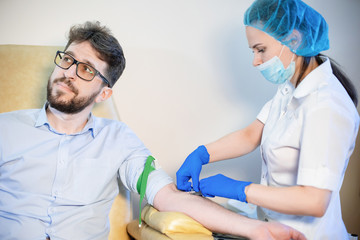 Nurse takes a blood test.