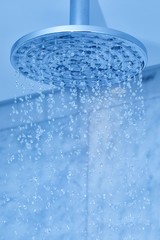 Naklejka na ściany i meble Shower water flowing