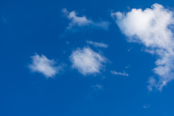 White clouds blue sky. Blue sky with white clouds background. Blue sky with clouds wallpaper. 