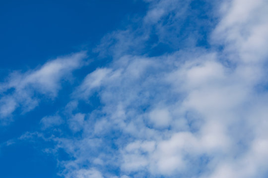 White clouds blue sky. Blue sky with white clouds background. Blue sky with clouds wallpaper. 