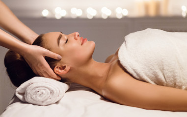 Obraz na płótnie Canvas Head Massage. Woman Relaxing At Spa Salon