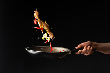 Chef prepares sea food, mantis shrimp with lemon and hot pepper, East Asian cuisine, dilikates, on...