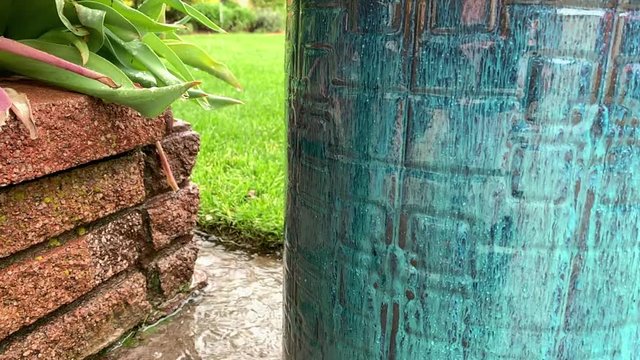 SloMo - Rain Splashing on a Patio