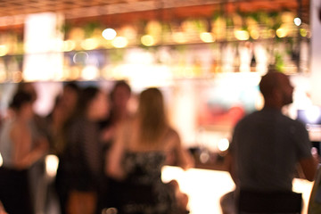 Blurred background of many people had fun at a beach party.
