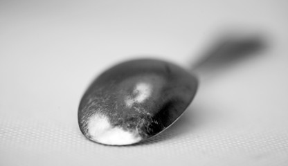 a metal spoon lying down