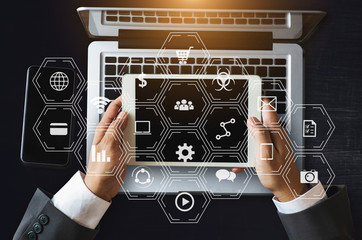 Coding software developer work with augmented reality dashboard computer icons  with responsive...