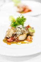 Delicious appetizer scallops with caviar.  plate fine dining restaurant