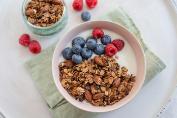 Granola with yogurt and berries for healthy breakfast