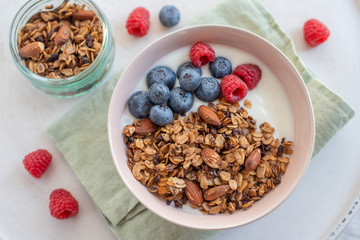 Granola with yogurt and berries for healthy breakfast