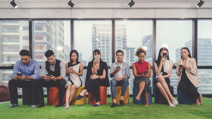 collage concepts of different happy people in casual style and different age holding cellphone, checking and using messenger