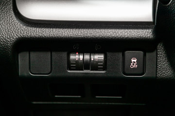 Сlose-up of the car  black interior: off road  and other buttons