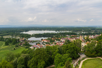 Fototapeta na wymiar Aerial view to Hluboka nad Vltavou with pond Municky, Czech landscape