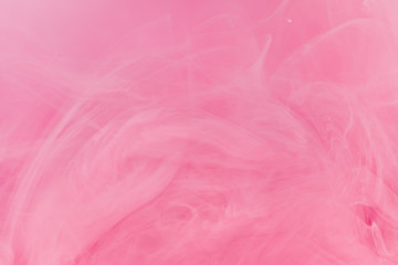 Fototapeta na wymiar ink in water, pink smoke texture background