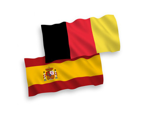 National vector fabric wave flags of Belgium and Spain isolated on white background. 1 to 2 proportion.