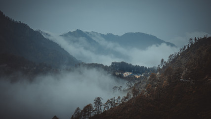 Mountains are covered by clouds