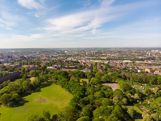 Aerial photo of the town known as Headingley in Leeds West Yorkshire, you can see the Leeds university in the background and the Leeds City Centre taken with a drone on a beautiful sunny day.