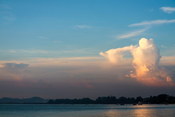 white orange sunset cloud sunshine in blue sky over sea