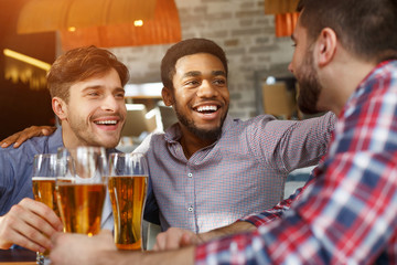 Long-Awaited Meeting. Best Friends Drinking Beer In Bar
