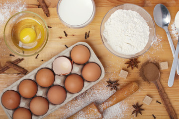 Food ingredients for baking: flour, eggs, milk, sugar