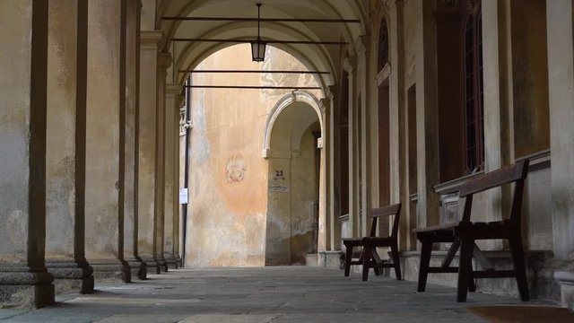 Long Porticos Chapel with windows at the Sacred Mountain of Varallo, a christian devotional complex, a unesco world heritage si in Italy. Zoom in 4k footage