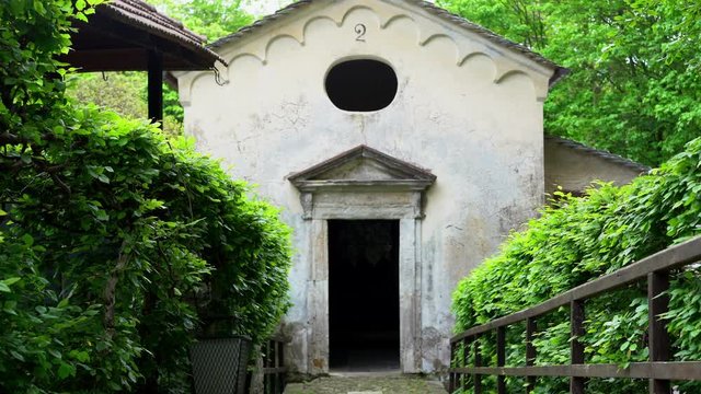 A beautiful travel tour at the Sacred Mountain of Varallo, a christian devotional complex, a unesco world heritage si in Italy. Zoom in 4k footage