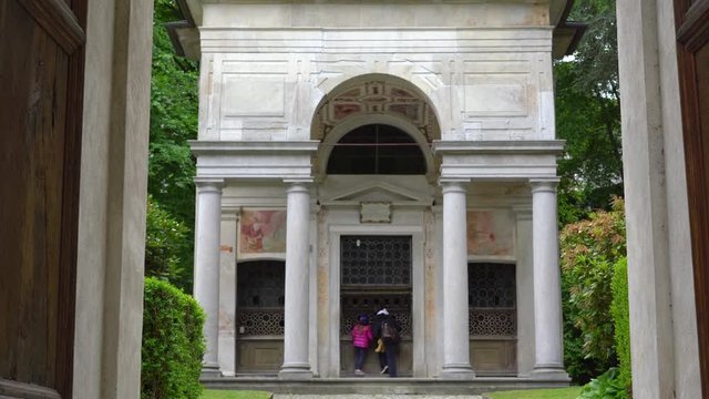 A beautiful travel tour at the Sacred Mountain of Varallo, a christian devotional complex, a unesco world heritage si in Italy. Zoom out 4k footage