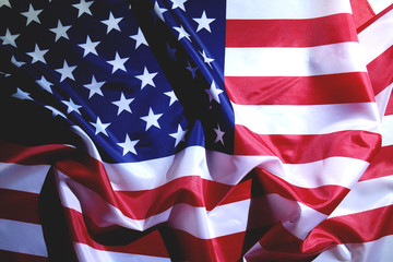 Waving star and striped American flag.