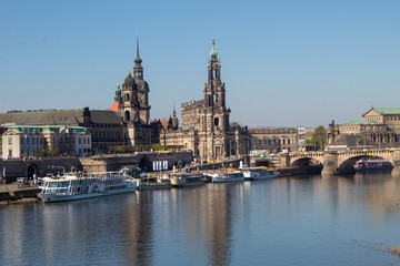 Dresden streets with beautiful architectural masterpieces in the Baroque and Art Nouveau style on a sunny Easter day.