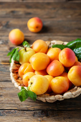 Naklejka na ściany i meble Sweet apricots on the wooden table