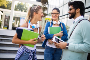Group of friends studying together at university campus