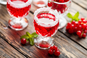 Red currant liquor with sugar and mint