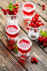 Red currant liquor with sugar and mint