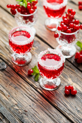 Red currant liquor with sugar and mint