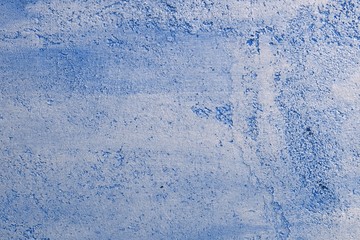 nice grunge blue travertine like stucco texture for use as background.