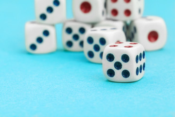 Gaming dices on blue background. Game concept.